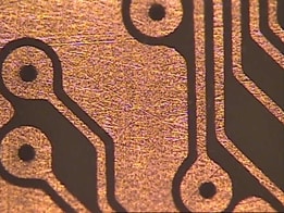 Nine-mil pad and a three-mil via with 40 micron lines.