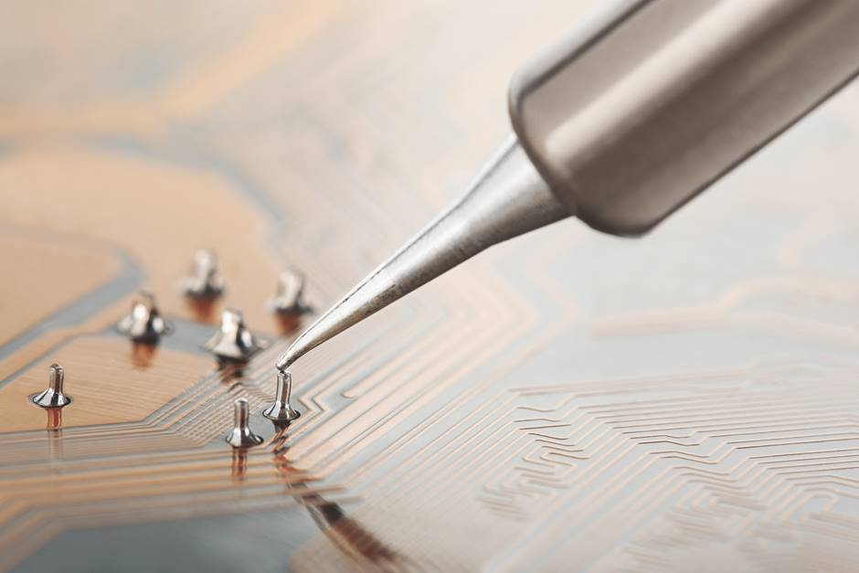 Soldering electronic components on to a PCB