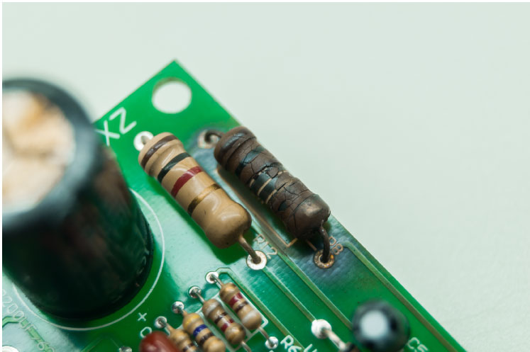 burnt-out-resistor-on-a-circuit-board.jpg