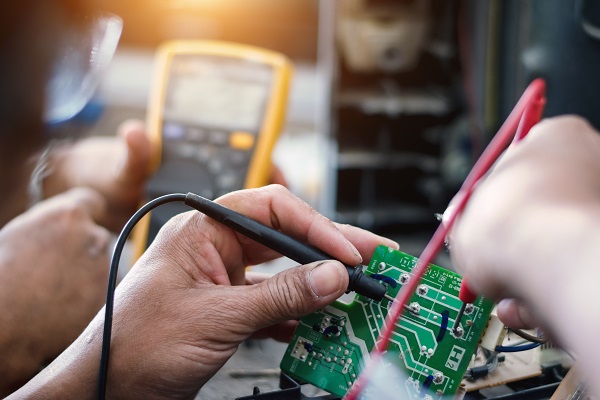 testing-pcb-with-multimeter.jpg